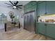 Eat-in kitchen with stainless steel appliances, wooden floors, and a dining area at 4492 Bryten Dr, Douglasville, GA 30135