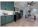 Kitchen features green cabinets, wine cooler, and coffee bar at 4492 Bryten Dr, Douglasville, GA 30135