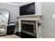 Cozy living room with fireplace and wood-paneled accents at 4492 Bryten Dr, Douglasville, GA 30135