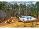 Community pool with playground and clubhouse at 4492 Bryten Dr, Douglasville, GA 30135