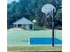 Community basketball court with a pavilion, perfect for recreational sports and neighborhood fun at 6196 Windflower Dr, Powder Springs, GA 30127