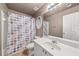 Small bathroom with shower/tub combo at 6196 Windflower Dr, Powder Springs, GA 30127