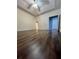 Large bedroom with hardwood floors and access to the bathroom at 6196 Windflower Dr, Powder Springs, GA 30127