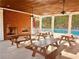 Covered picnic tables by the pool at 6196 Windflower Dr, Powder Springs, GA 30127