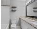 Bathroom with granite countertop and tiled shower at 5667 Kingsport Dr, Atlanta, GA 30342