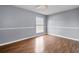 Bedroom with wood floors and ceiling fan at 5667 Kingsport Dr, Atlanta, GA 30342
