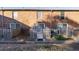 Rear view of brick building with fenced patios at 5667 Kingsport Dr, Atlanta, GA 30342