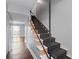 Interior view of a staircase with wood flooring at 5667 Kingsport Dr, Atlanta, GA 30342