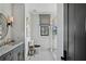 Elegant bathroom with marble vanity, subway tile, and walk-in shower at 6870 Colfax Ave, Cumming, GA 30040
