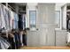 Large walk-in closet, built-in shelving and hanging space at 6870 Colfax Ave, Cumming, GA 30040