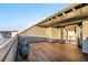 Spacious rooftop deck with wood flooring and views, perfect for entertaining at 6870 Colfax Ave, Cumming, GA 30040