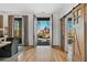 Bright and spacious entryway with hardwood floors and barn doors at 6870 Colfax Ave, Cumming, GA 30040