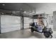 Attached garage with golf cart and extra storage space at 6870 Colfax Ave, Cumming, GA 30040
