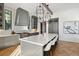 Modern kitchen with gray cabinets, marble island, and herringbone floors at 6870 Colfax Ave, Cumming, GA 30040
