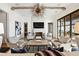 Bright living room with hardwood floors, fireplace, and comfortable seating at 6870 Colfax Ave, Cumming, GA 30040
