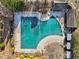 Community pool with surrounding lounge chairs at 6870 Colfax Ave, Cumming, GA 30040