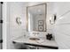 Elegant powder room with shiplap walls, marble vanity, and copper sink at 6870 Colfax Ave, Cumming, GA 30040