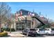 Modern restaurant with outdoor seating at 6870 Colfax Ave, Cumming, GA 30040