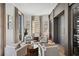 Relaxing wine room with built-in cabinetry and ample wine storage at 6870 Colfax Ave, Cumming, GA 30040
