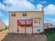 Elevated deck overlooking a partially fenced backyard at 1043 Carriage Trace Cir, Stone Mountain, GA 30087