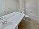 Clean bathroom with a vanity, toilet, and combined shower and tub at 1043 Carriage Trace Cir, Stone Mountain, GA 30087