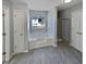 Bathroom with garden tub, shower and tile floors at 1043 Carriage Trace Cir, Stone Mountain, GA 30087
