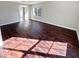 Dining room with hardwood floors and large window at 1043 Carriage Trace Cir, Stone Mountain, GA 30087