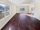 Bright living room featuring hardwood floors and large windows at 1043 Carriage Trace Cir, Stone Mountain, GA 30087