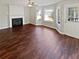 Living room with hardwood floors and fireplace at 1043 Carriage Trace Cir, Stone Mountain, GA 30087