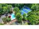 Community pool and tennis courts with lake access at 3495 Tulip Tree Ln, Duluth, GA 30096