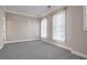 Spacious bedroom with neutral carpeting and large windows at 1963 Hosea L Williams Se Dr # 205, Atlanta, GA 30317