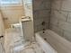 Bathroom with granite vanity and marble tile at 3705 Daisy Dr, Decatur, GA 30032