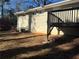 Back of house showing deck and HVAC unit at 3705 Daisy Dr, Decatur, GA 30032