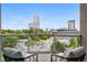 Relaxing balcony boasts stunning city views and comfortable seating at 2795 Peachtree Ne Rd # 703, Atlanta, GA 30305