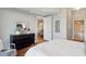 Bright bedroom with a dresser and access to the bathroom at 2795 Peachtree Ne Rd # 703, Atlanta, GA 30305