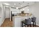 Modern kitchen with white cabinets and granite countertops at 2795 Peachtree Ne Rd # 703, Atlanta, GA 30305