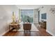 Spacious living room with hardwood floors and city views at 2795 Peachtree Ne Rd # 703, Atlanta, GA 30305