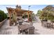 Outdoor patio with fireplace and seating area at 2795 Peachtree Ne Rd # 703, Atlanta, GA 30305