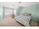 Spacious bedroom with large window and neutral walls at 1561 Annapolis Way, Grayson, GA 30017