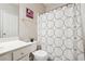 Small bathroom with shower and updated vanity at 2234 Oak Falls Ln, Buford, GA 30519