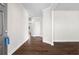 Welcoming foyer with hardwood floors, neutral paint, and clear views into the adjoining rooms at 2417 Kingston Heath Way, Marietta, GA 30008