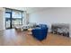 Comfortable bedroom with hardwood floors and city view at 788 W Marietta Nw St # 212, Atlanta, GA 30318