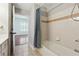 Bathroom with shower/tub combo and tiled walls at 1101 Juniper Ne St # 415, Atlanta, GA 30309