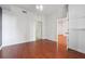 Bedroom with hardwood floors and access to another room at 1101 Juniper Ne St # 415, Atlanta, GA 30309