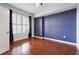 Bright bedroom with hardwood floors and window at 1101 Juniper Ne St # 415, Atlanta, GA 30309