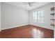 Bright bedroom with hardwood floors, ceiling fan and built-in shelves at 1101 Juniper Ne St # 415, Atlanta, GA 30309