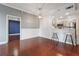 Spacious dining room with hardwood floors and an open view into the kitchen at 1101 Juniper Ne St # 415, Atlanta, GA 30309