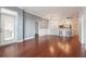 Open living room showcasing hardwood floors and access to kitchen at 1101 Juniper Ne St # 415, Atlanta, GA 30309