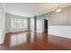 Spacious living room with hardwood floors and large windows at 1101 Juniper Ne St # 415, Atlanta, GA 30309