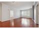 Large living room featuring hardwood floors and ample natural light at 1101 Juniper Ne St # 415, Atlanta, GA 30309